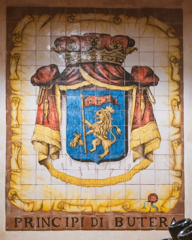 La storia di Principi di Butera è un viaggio nel tempo, che affonda le radici nella millenaria nobiltà della Sicilia, l’antica Trinacria, crocevia delle civiltà mediterranee. 🌍🍇

La dinastia dei Branciforte, una delle più importanti nella storia dell’isola, deteneva una parte considerevole delle ricchezze siciliane, con possedimenti che nel 1700 rappresentavano circa il 10% del reddito dell’intera Sicilia. 🏰

Il loro stemma, che troverai in diversi angoli della nostra Tenuta, racconta la lunga e affascinante storia del Principato di Butera, che rimase sotto il loro dominio fino all’abolizione del feudalesimo nel 1812, con la promulgazione della Costituzione Siciliana da parte di re Ferdinando III di Borbone. 👑

Un luogo ricco di storia e tradizione, dove la passione per il vino si intreccia con il fascino di un passato nobile. 🍷✨

The history of Principi di Butera is a journey through time, deeply rooted in the ancient nobility of Sicily, the land of Trinacria, a crossroads of Mediterranean civilizations. 🌍🍇

The Branciforte dynasty, one of the most important in Sicilian history, held a significant portion of the island’s wealth, with estates in the 1700s that accounted for approximately 10% of Sicily’s entire income. 🏰

Their coat of arms, visible in various parts of our estate, tells the fascinating story of the Principality of Butera, which remained under their control until the abolition of feudalism in 1812, following the enactment of the Sicilian Constitution by King Ferdinand III of Bourbon. 👑

A place rich in history and tradition, where the passion for wine intertwines with the allure of a noble past. 🍷✨

#MadeInItaly #Vino #Wine #ItalianWines #Sicilia #Sicily #Holiday #LaDolceVita #Sunset #SunsetLovers #ItalianSunset #SicilyPicture